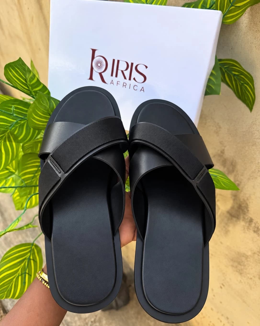 TABI Palm in Black: crossed smooth and textured black straps over a black footbed